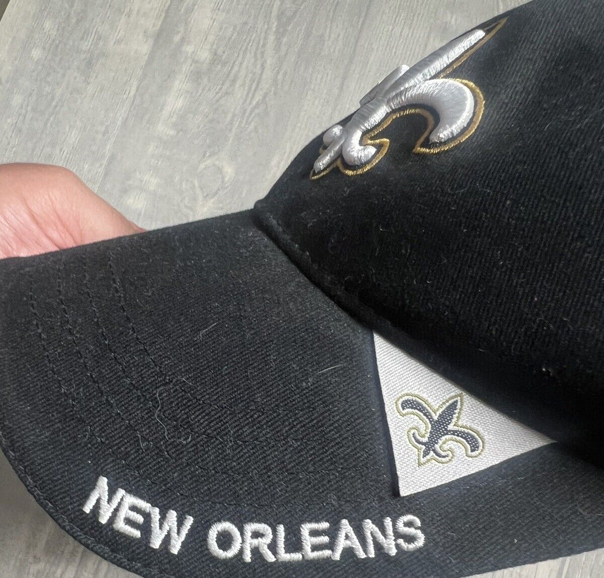 New Orleans Saints Black Adjustable NFL Hat On Field Strapback Cap