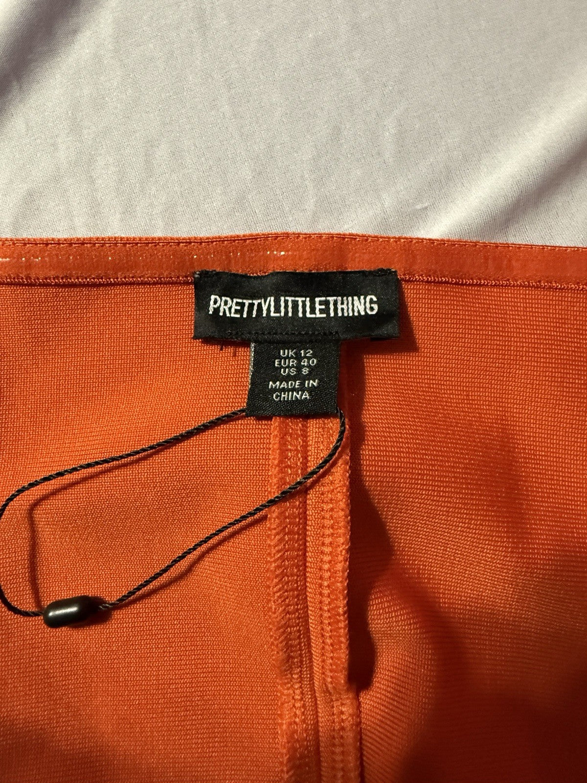 Pretty little thing orange corset size 8