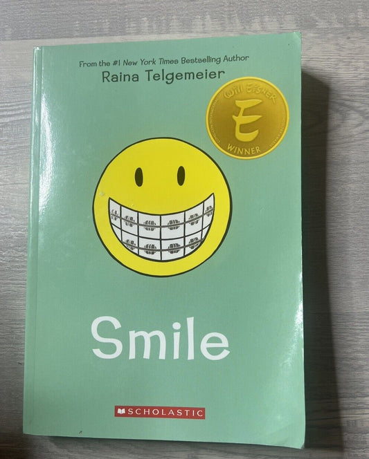 Smile Paperback Book by Raina Telgemeier